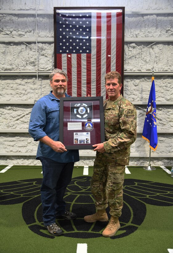 Chief Ziegler poses with Brent Maney.