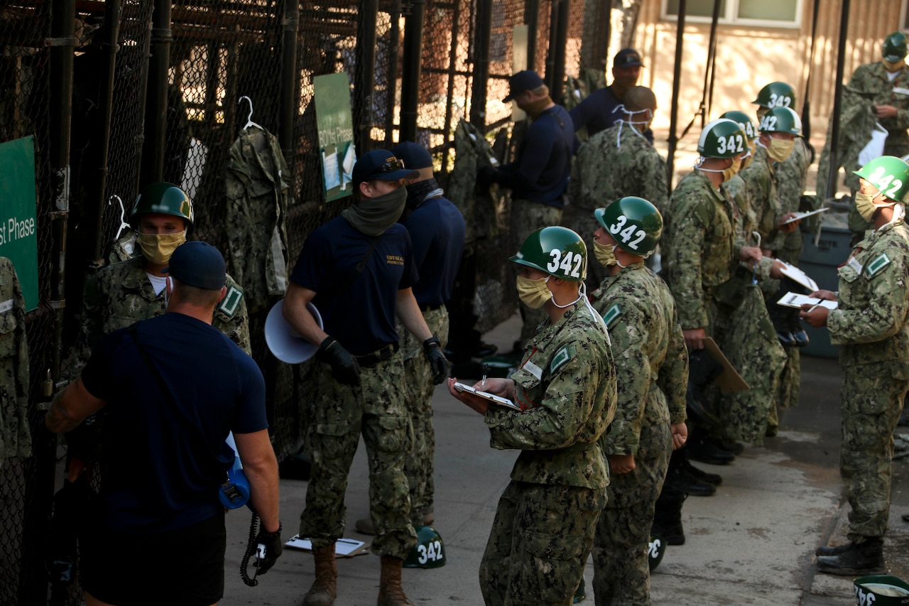 SEAL candidates undergo inspection.