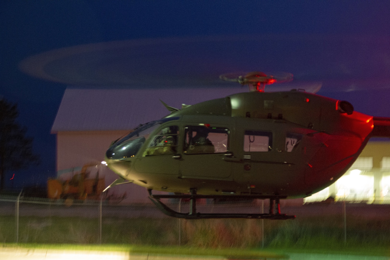 An Iowa Army National Guard UH-72 Lakota helicopter departs the Iowa National Guard Readiness Center in Iowa City, Iowa, after transferring COVID-19 test kits May 4, 2020. The helicopter transported the test kits from a Test Iowa site in Sioux City to the State Hygienic Laboratory in Coralville, Iowa.