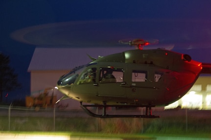 An Iowa Army National Guard UH-72 Lakota helicopter departs the Iowa National Guard Readiness Center in Iowa City, Iowa, after transferring COVID-19 test kits May 4, 2020. The helicopter transported the test kits from a Test Iowa site in Sioux City to the State Hygienic Laboratory in Coralville, Iowa.