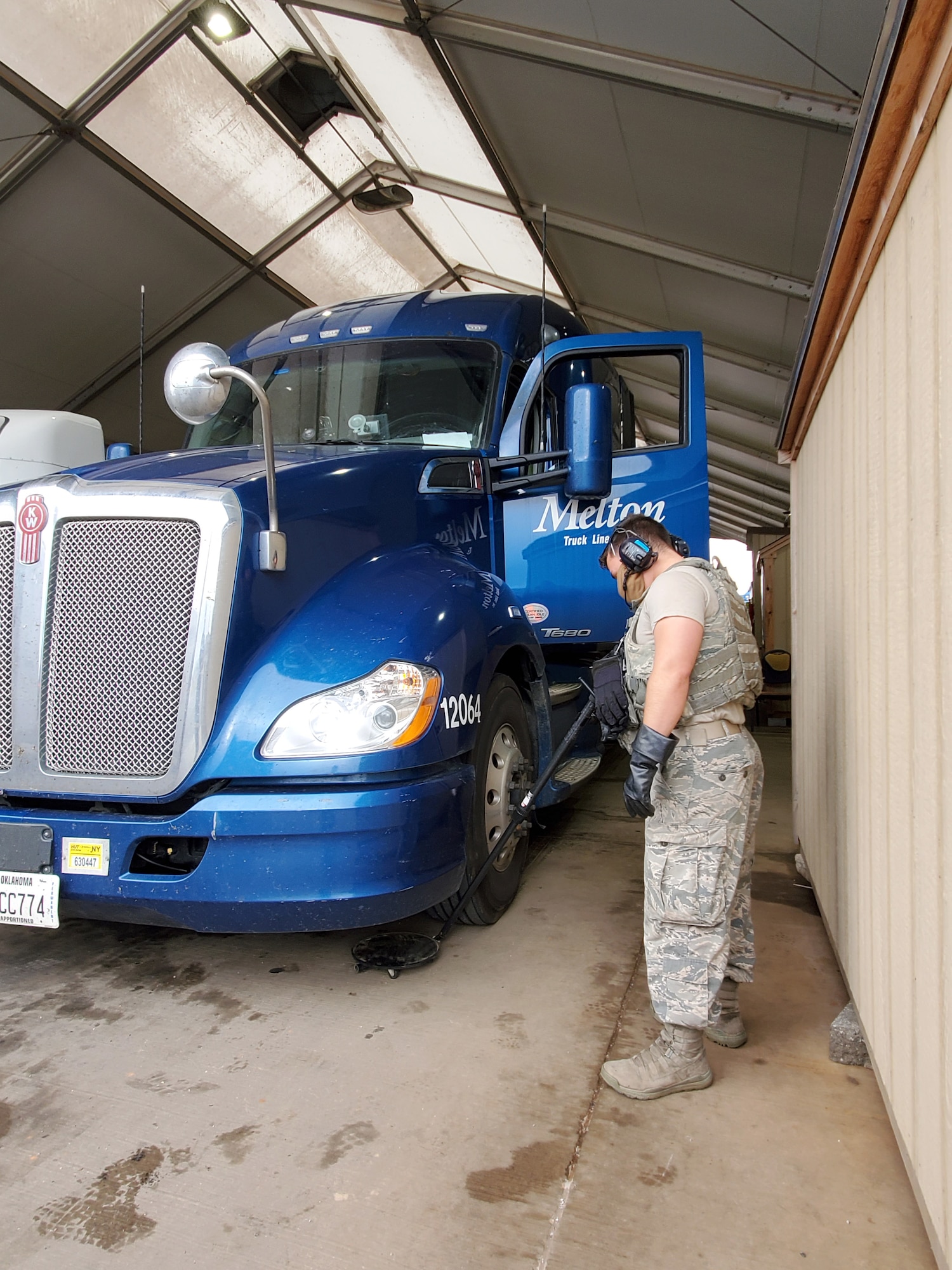 Commercial and contract vehicles needing to enter the Tinker installation first have to enter through the Truck Gate. The drivers have to be vetted through background checks and have to have a correctly completed bill of lading. Their vehicles will undergo a search for any sign or evidence of weapons, ammunition, narcotics or explosives. (U.S. Air Force photo/Kelly White)