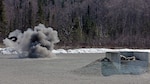 Frag Out! Alaska Air Guard Pararescuemen throw Grenades with Geronimo Soldiers