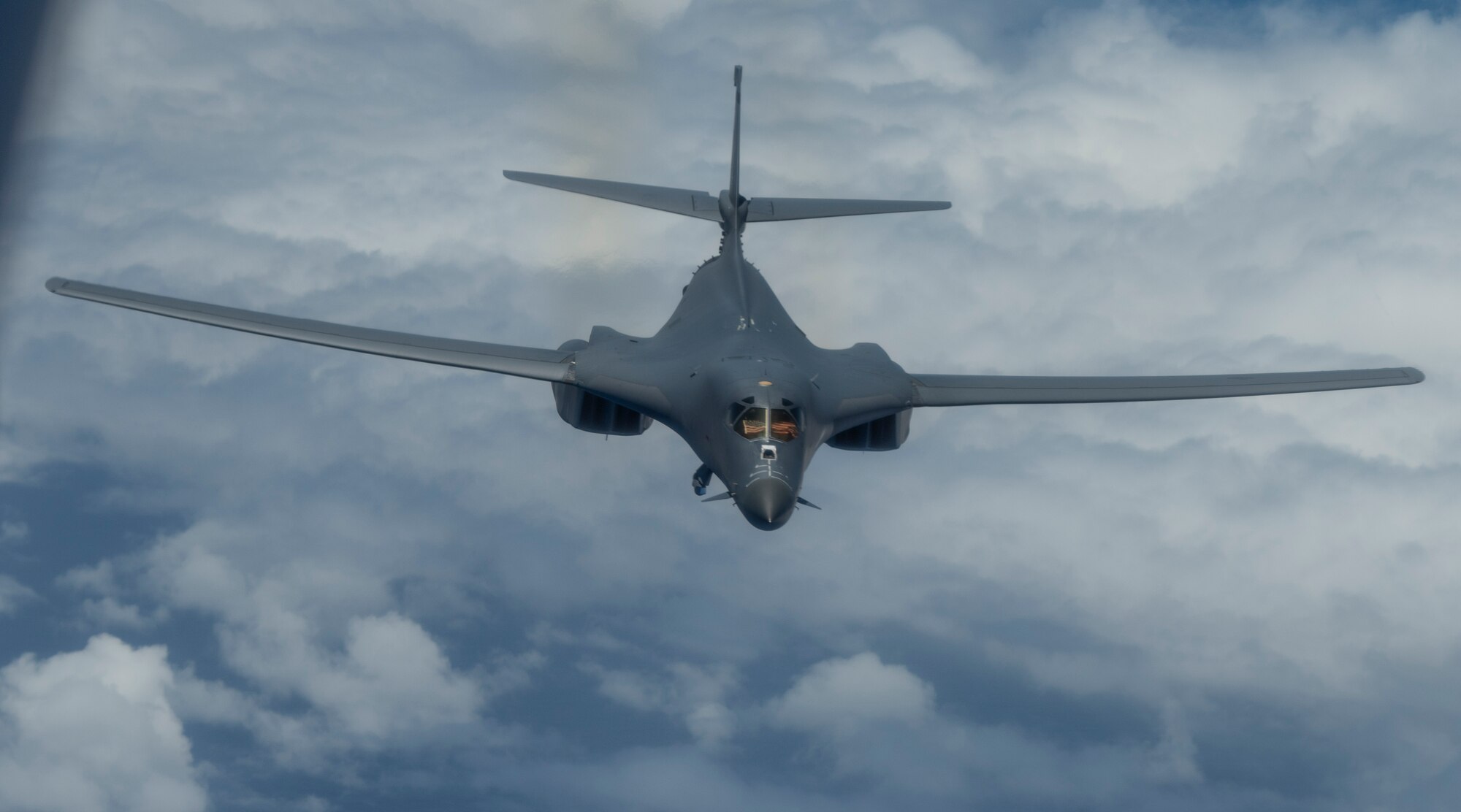 A 9th Expeditionary Bomb Squadron B-1B Lancer flies over the East China Sea May 6, 2020, during a training mission. The 9th EBS is deployed to Andersen Air Force Base, Guam, as part of a Bomber Task Force supporting Pacific Air Forces’ strategic deterrence missions and  commitment to the security and stability of the Indo-Pacific region. (U.S. Air Force photo by Senior Airman River Bruce)