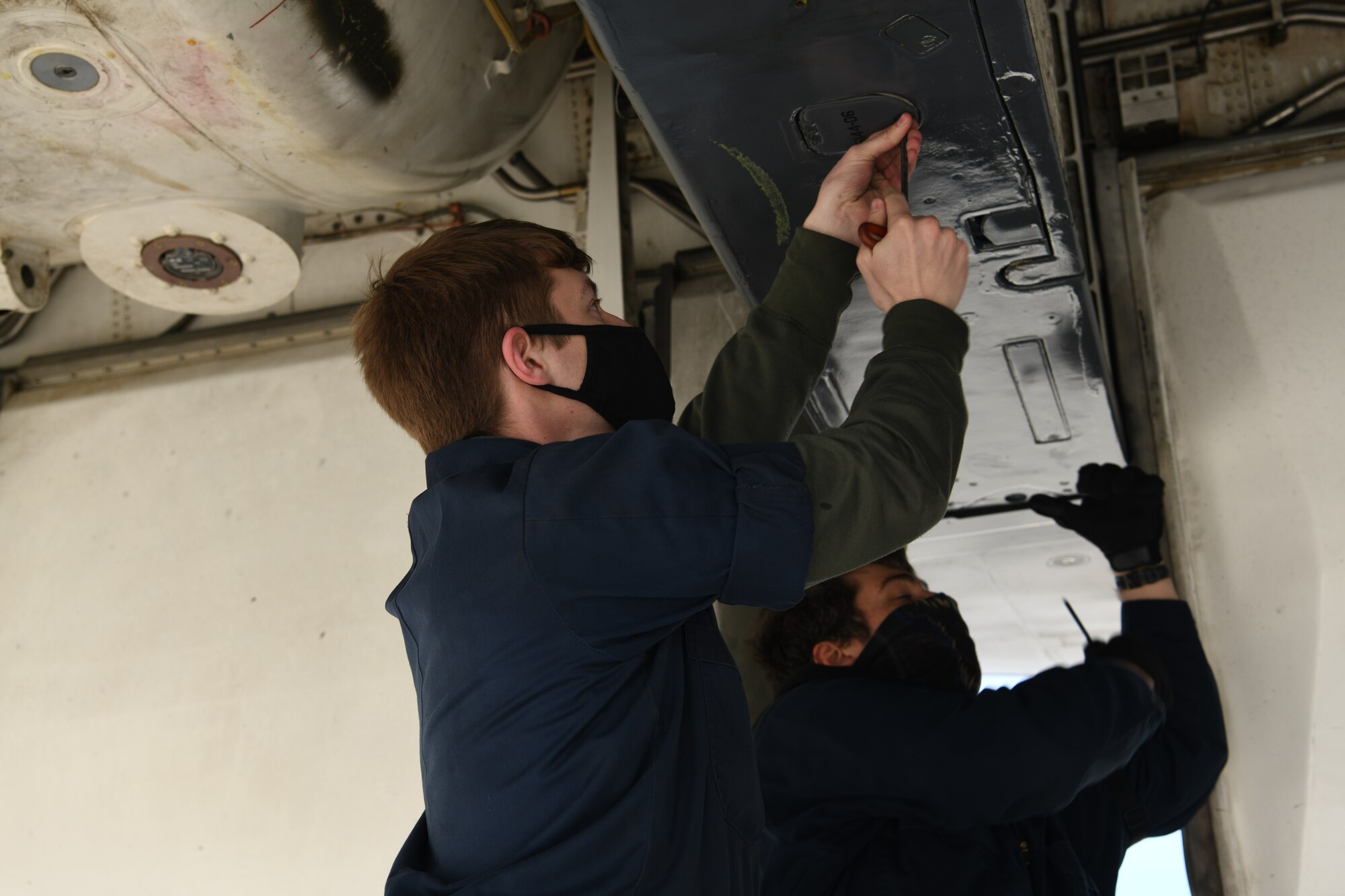 Airmen assigned to the 28th Aircraft Maintenance Unit inspect a B-1B Lancer prior to a non-stop deployment from Ellsworth Air Force Base, S.D., May 4, 2020. The Department of Defense maintains command and control of its bomber forces for any mission, anywhere in the world, at any time. (U.S. Air Force photo by Senior Airman Nicolas Z. Erwin)