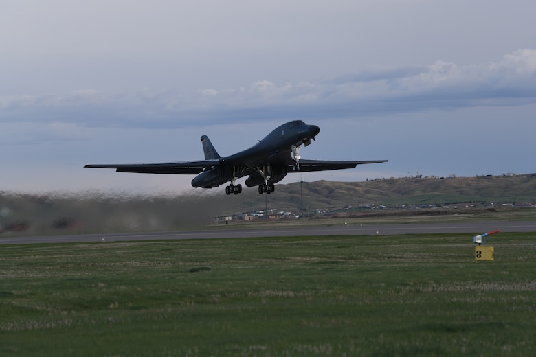 A B-1B Lancer launches for a non-stop deployment from Ellsworth Air Force Base, S.D., May 4, 2020. U.S. Strategic Command routinely conducts Bomber Task Force operations across the globe as a demonstration of U.S. commitment to collective defense and to integrate with Geographic Combatant Command operations and activities. (U.S. Air Force photo by Senior Airman Nicolas Z. Erwin)