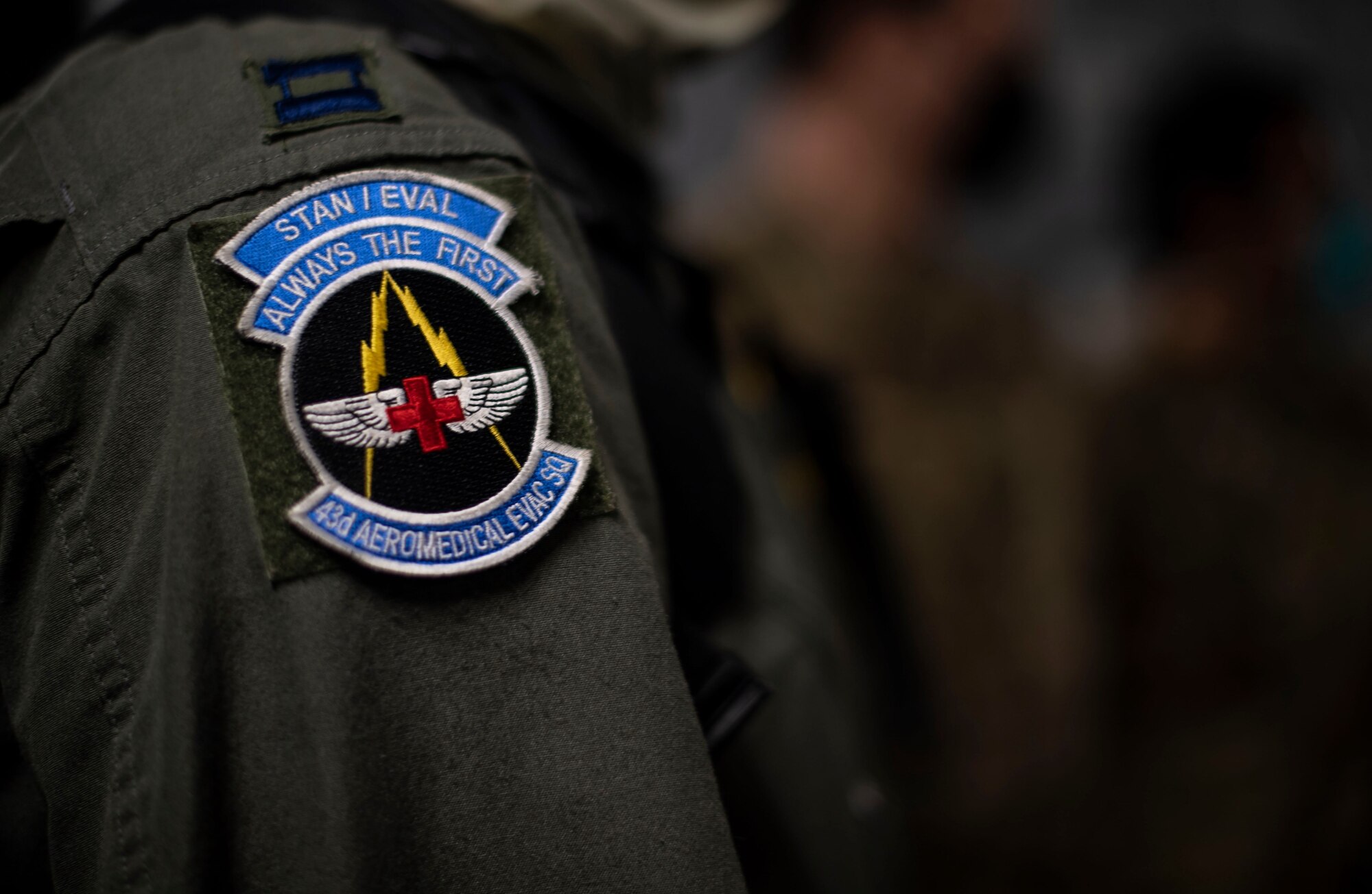 U.S. Air Force Capt. Steven Woods, 43rd Aeromedical Evacuation Squadron Detachment 1 flight nurse, participates in a pre-flight meeting with other 43rd AES members aboard a C-17 Globemaster III April 27, 2020, at Travis Air Force Base, California. The 43rd AES Detachment 1 is scheduled to activate as a full squadron in June and integrate into Travis’ 60th Operations Group by the end of the year. (U.S. Air Force photo by Senior Airman Christian Conrad)