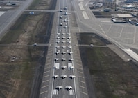 U.S. Air Force aircraft assigned to the 3rd Wing, 176th Wing and the 477th Fighter Group form an elephant walk at Joint Base Elmendorf-Richardson, Alaska, May 5, 2020. The large show-of-force demonstrated the wings’ rapid mobility capabilities and response readiness during COVID-19 and also highlighted the ability to generate combat airpower at a moment’s notice to ensure regional stability throughout the North American Aerospace Defense Command Region and Indo-Pacific.