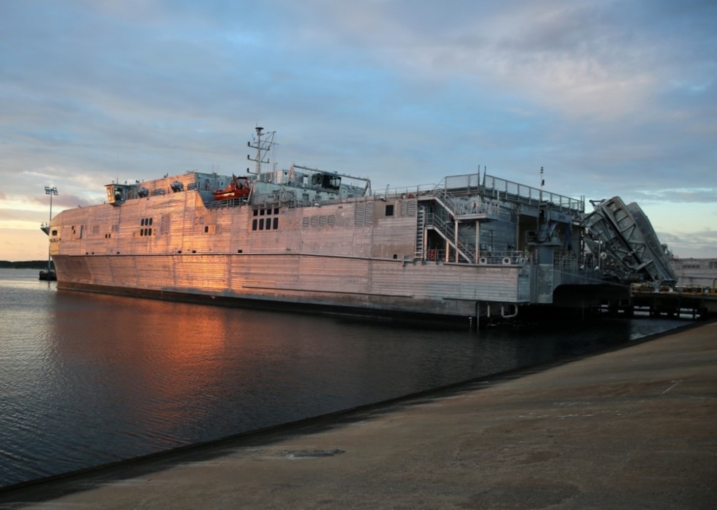 170701-N-OH262-002 VIRGINIA BEACH, Va. (July 1, 2017) -- A view of Military Sealift Command's expeditionary fast transport ship USNS Yuma (T-EPF 8) pier-side onboard Joint Expeditionary Base Little Creek-Fort Story, July 1. EPF class ships are designed to transport 600 short tons of military cargo 1,200 nautical miles at an average speed of 35 knots. The ship is capable of operating in austere ports and waterways, interfacing with roll-on/roll-off discharge facilities, and on/off-loading a combat-loaded Abrams main battle tank. (U.S. Navy photograph by Bill Mesta/released)