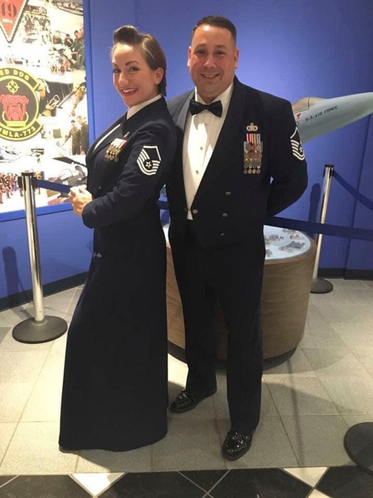U.S. Air Force Master Sgt. Amanda “Mae” Arguello, 52nd Fighter Wing deputy chief, wing protocol, and Senior Master Sgt. Alvin “Al” F. Arguello II, Air Force Security Forces Center superintendent of strategic plans and programs, pose for a photo at a ceremony in 2017 at Robins Air Force Base, Georgia. Al and Mae have been coping with the COVID-19 pandemic by continuing to grow in their marriage despite the temporary distance the virus caused. (Photo courtesy of Master Sgt. Amanda “Mae” Arguello)