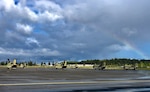 After a rainy morning a rainbow appears over the CH-47 Chinook helicopters during Bravo Company, 1st Battalion, 168th General Support Aviation deployment ceremony at the Washington Army National Guard Army Aviation Support Facility at Joint Base Lewis-McChord, Washington, May 6, 2020. Bravo Company is set to deploy to the Middle East for the third time in 10 years.