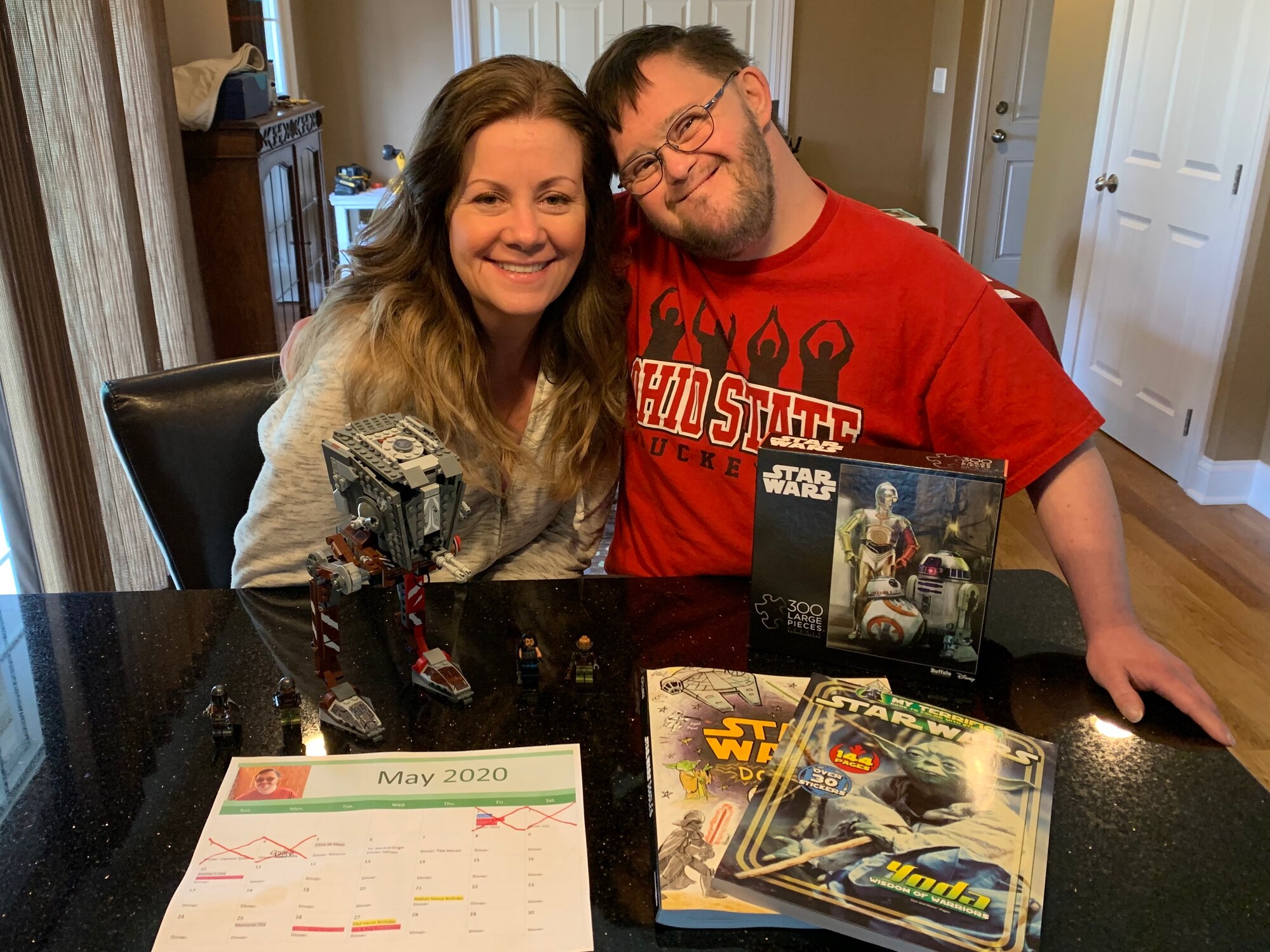 Tracy Vance, an AFRL Sensors Directorate financial operations specialist, poses for a photo with her brother-in-law Justin Vance. Tracy and her husband brought in Justin from his group home for special needs during the COVID-19 pandemic, as his immune system is compromised. (Courtesy Photo)