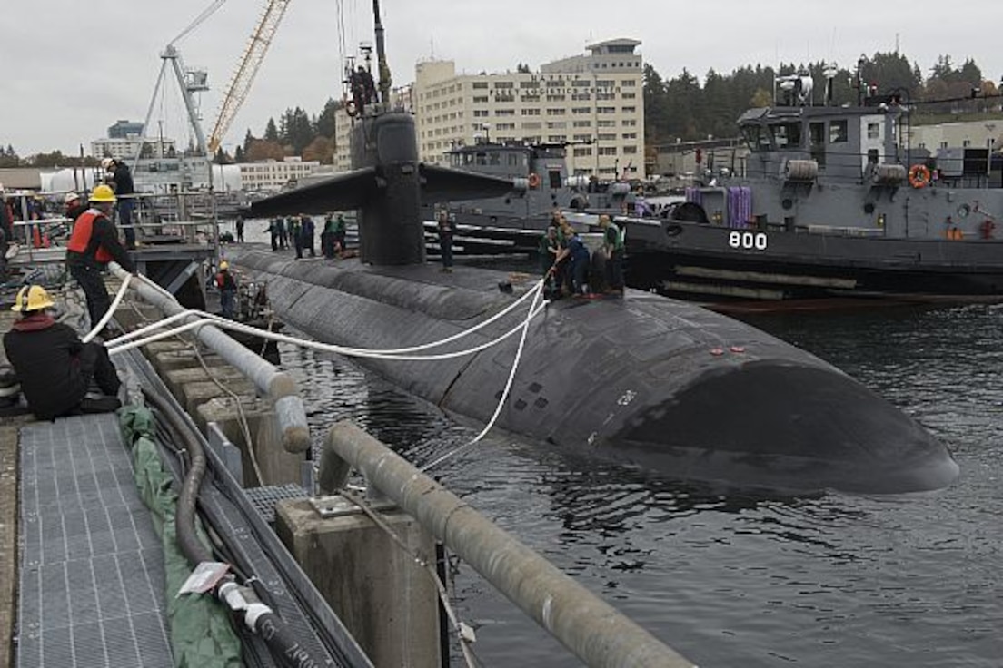 BREMERTON, Wash. (Oct. 22, 2019) The Los Angeles-class fast-attack submarine USS Louisville (SSN 724) arrives at Naval Base Kitsap-Bremerton to commence the inactivation and decommissioning process. Louisville conducted its final transit from Pearl Harbor, Hawaii, to Bremerton, Washington, for its final underway and homeport change. Commissioned in 1986, Louisville made naval history by firing the first submarine-launched Tomahawk cruise missile in war during Operation Desert Shield/Desert Storm. (U.S. Navy photo by LT Mack Jamieson/Released)