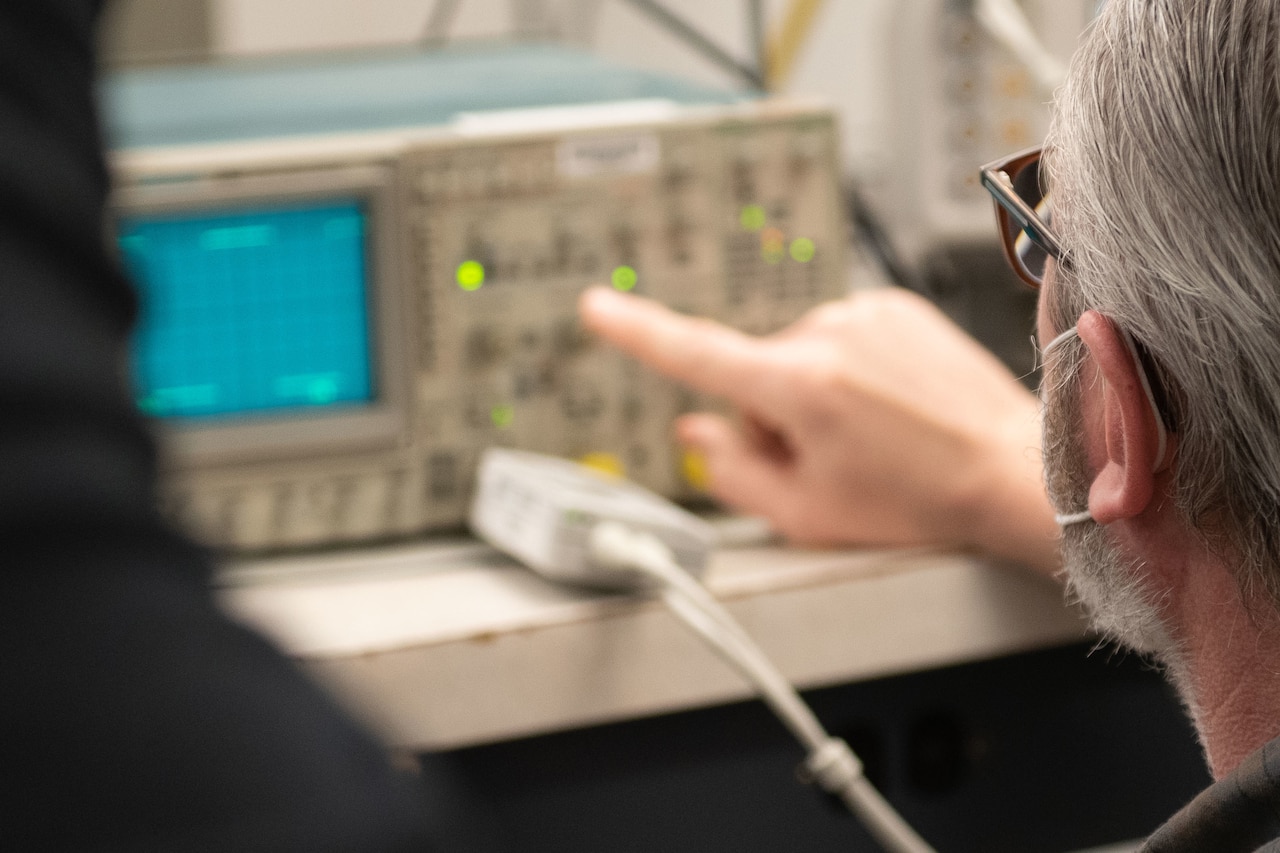 Lab technician conducts pulse measurements.