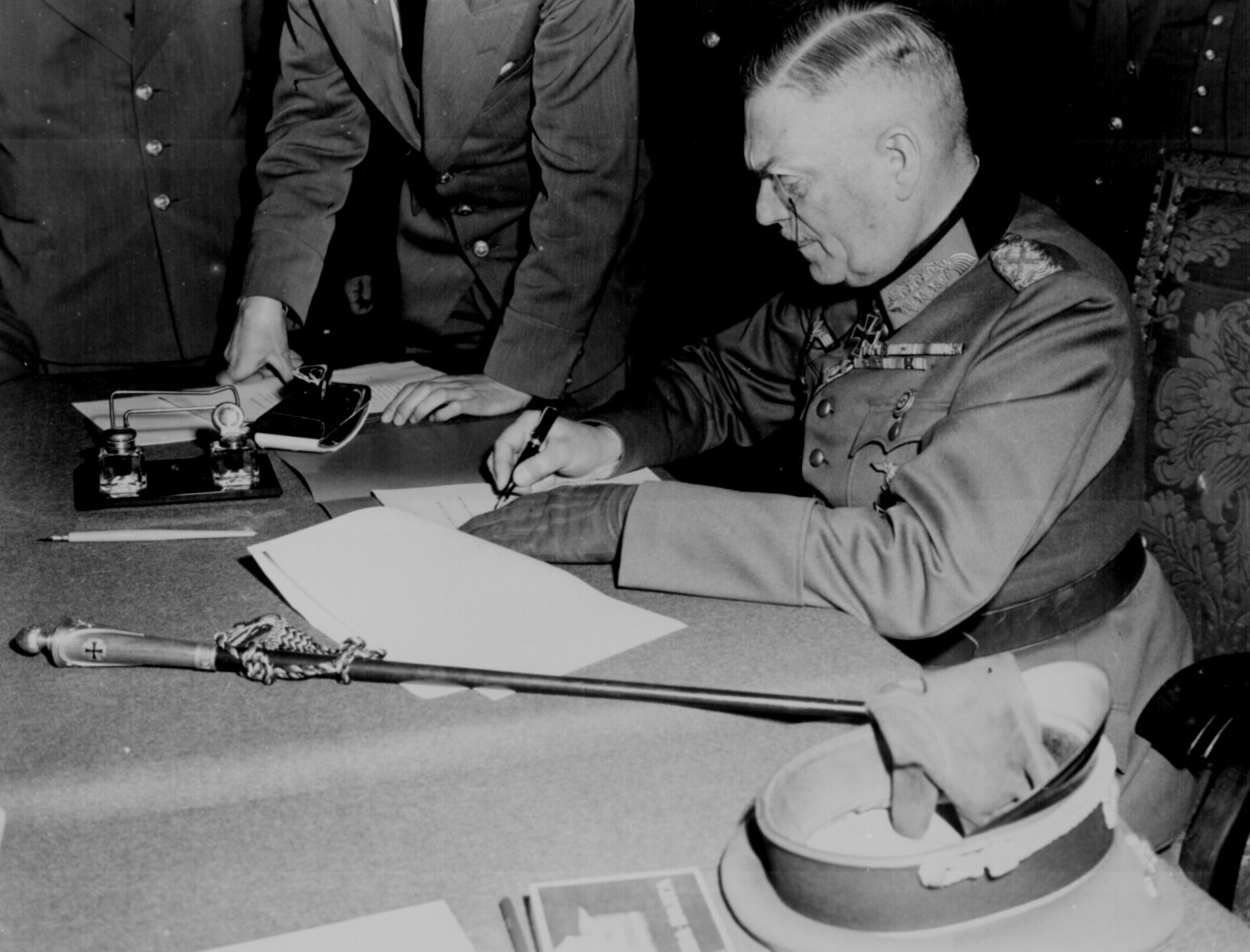 Field Marshall Wilhelm Keitel signs the ratified surrender terms for the German Army at Russian Headquarters, May 7, 1945, Berlin Germany.