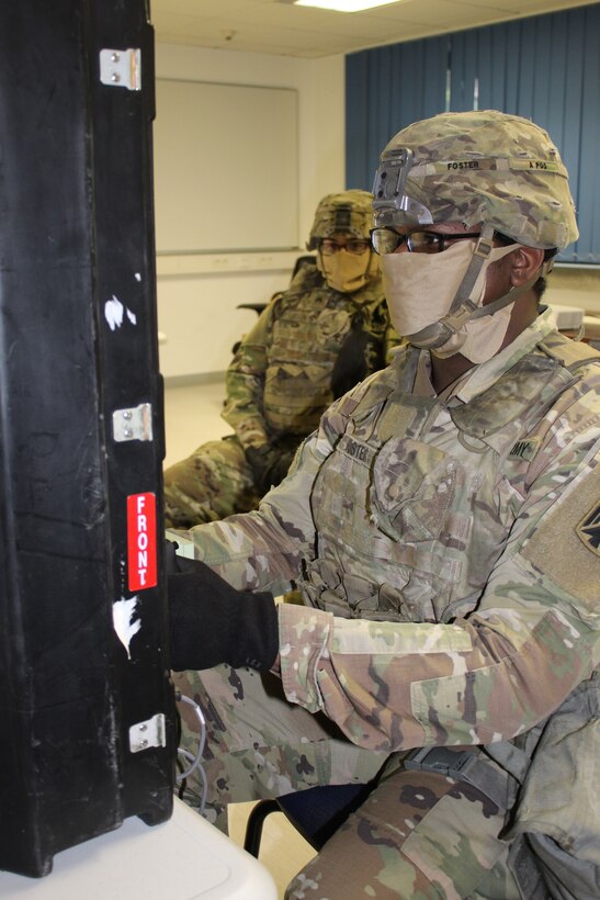 Soldiers ready a short-range air defense missile system.