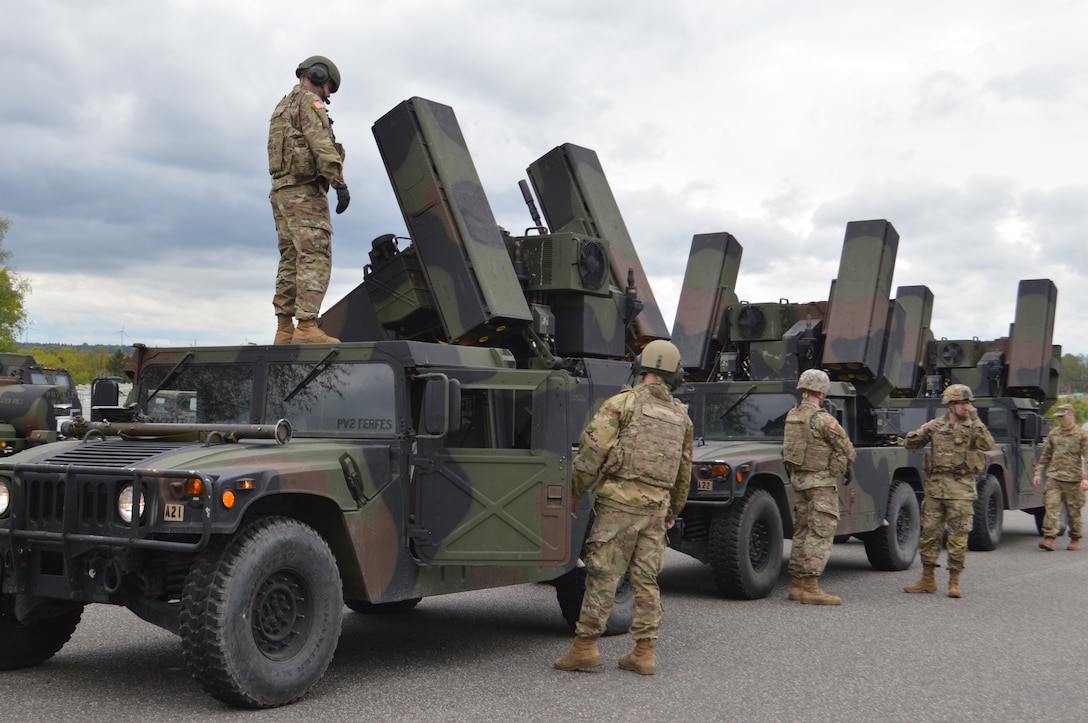 Soldiers ready a short-range air defense missile system.