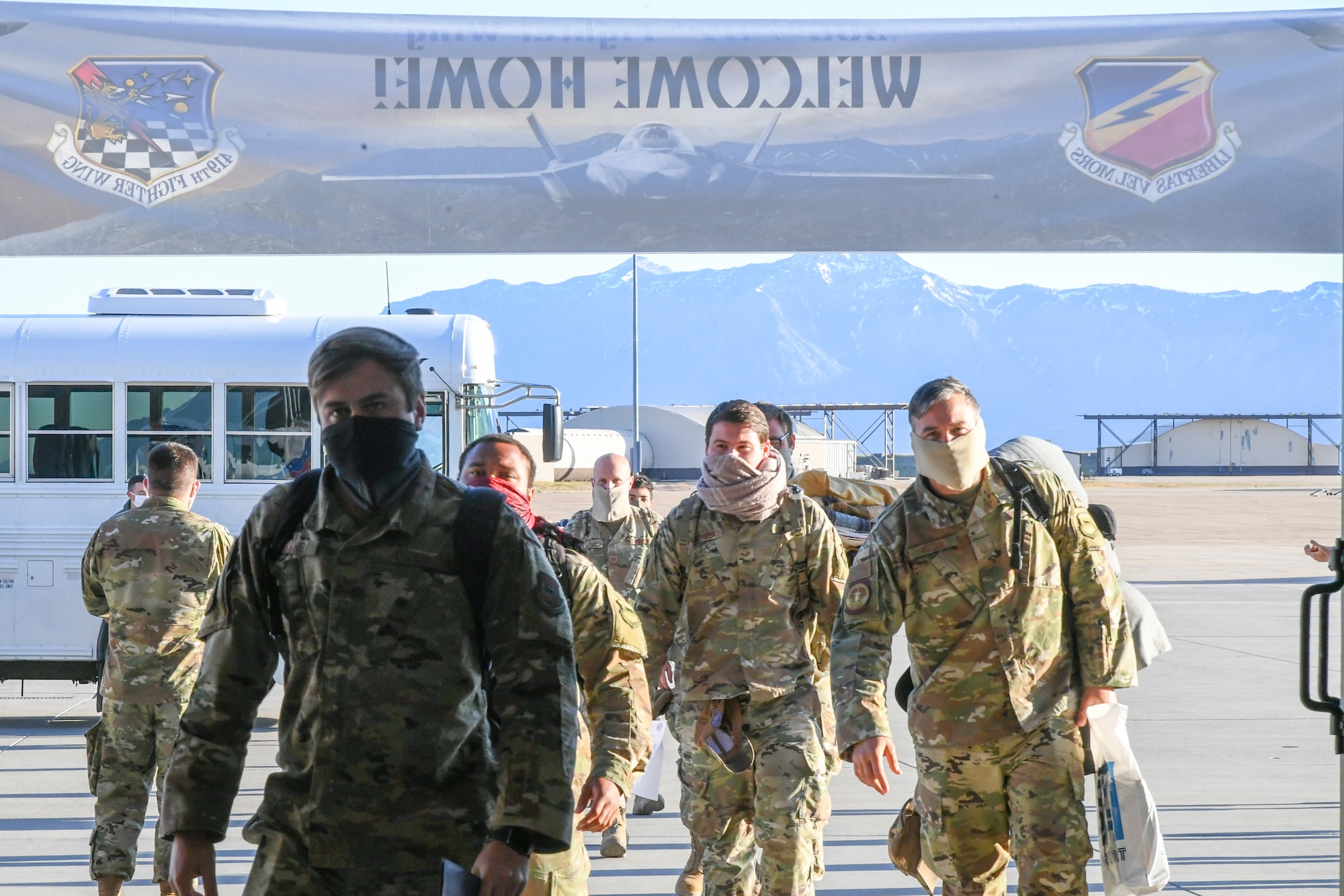 Airmen from the active duty 388th and Reserve 419th Fighter Wings arrive May 7, 2020, at Hill Air Force Base, Utah, following a six-month deployment to the Middle East. The Airmen will be quarantined for 14 days as a precaution against the spread of the coronavirus.