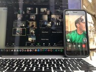 Physical Training leaders from the Command, Control, Communications, Intelligence and Networks Directorate prepare to lead a virtual workout session from their homes outside Hanscom Air Force Base Mass., this month. The weekly challenges are meant to keep members physically fit while socially connected during physical distance restrictions. (courtesy photo)