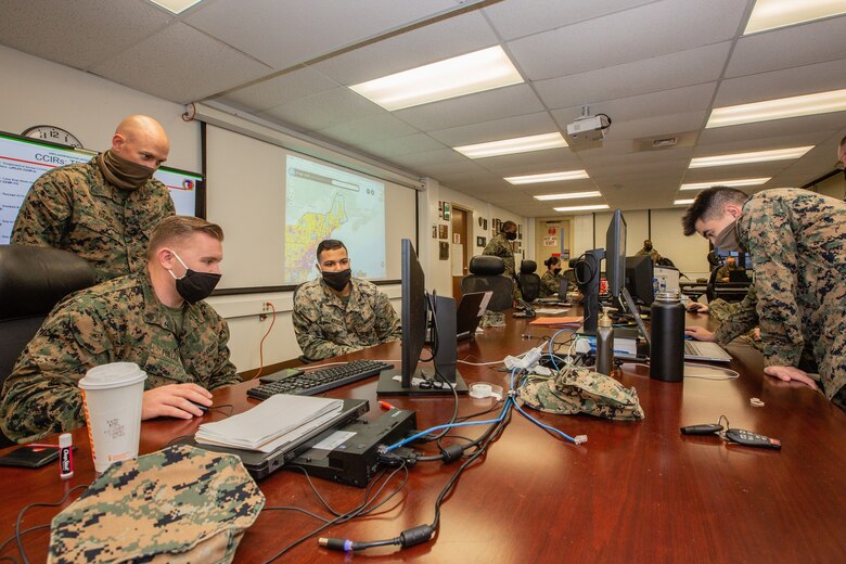 Marines with II Marine Expeditionary Force, Task Force Northeast, and augmented service members command and control Title 10 forces in support of the Federal Emergency Management Agency at Fort Devens, Mass., April 26, 2020. The U.S. Northern Command, through U.S. Army North, remains committed to providing flexible Department of Defense support to FEMA for the whole-of-nation COVID-19 response. (U.S. Marine Corps photo by Staff. Sgt. Hector de Jesus)
