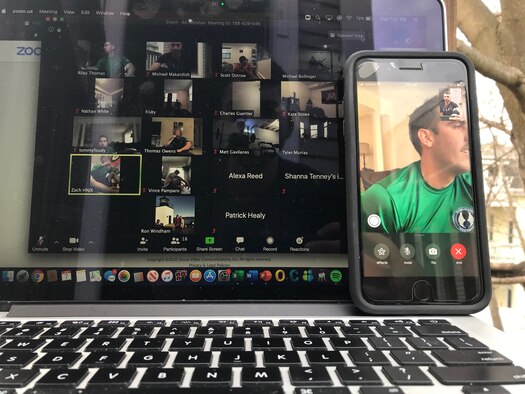 Physical Training leaders from the Command, Control, Communications, Intelligence and Networks Directorate prepare to lead a virtual workout session from their homes outside Hanscom Air Force Base Mass., this month. The weekly challenges are meant to keep members physically fit while socially connected during physical distance restrictions. (courtesy photo)