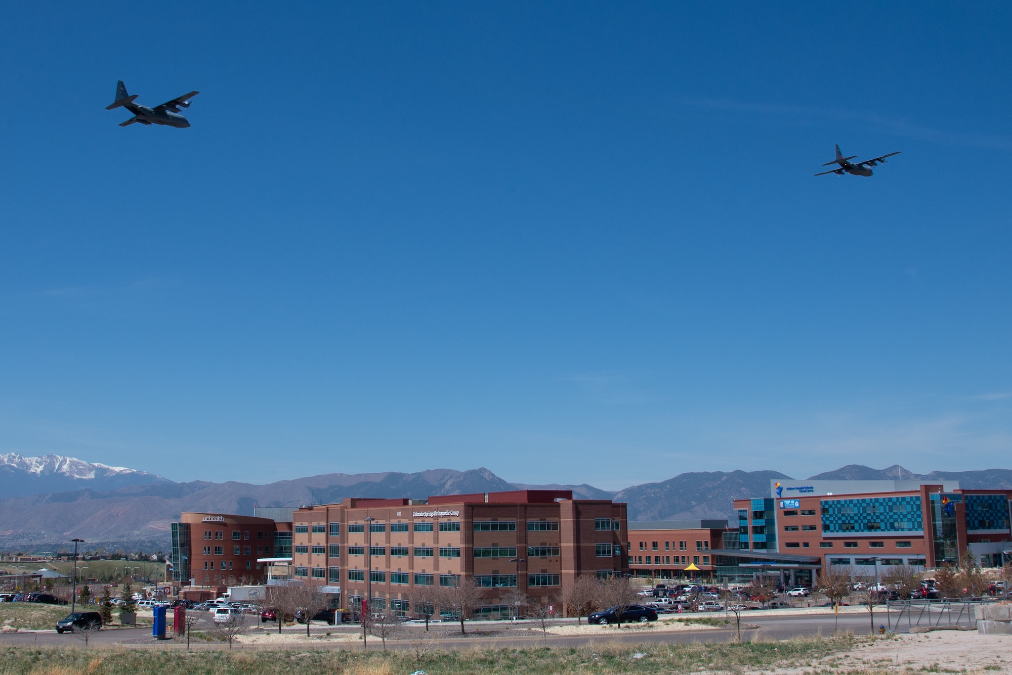 Image shows two large aircraft over Colorado hospital