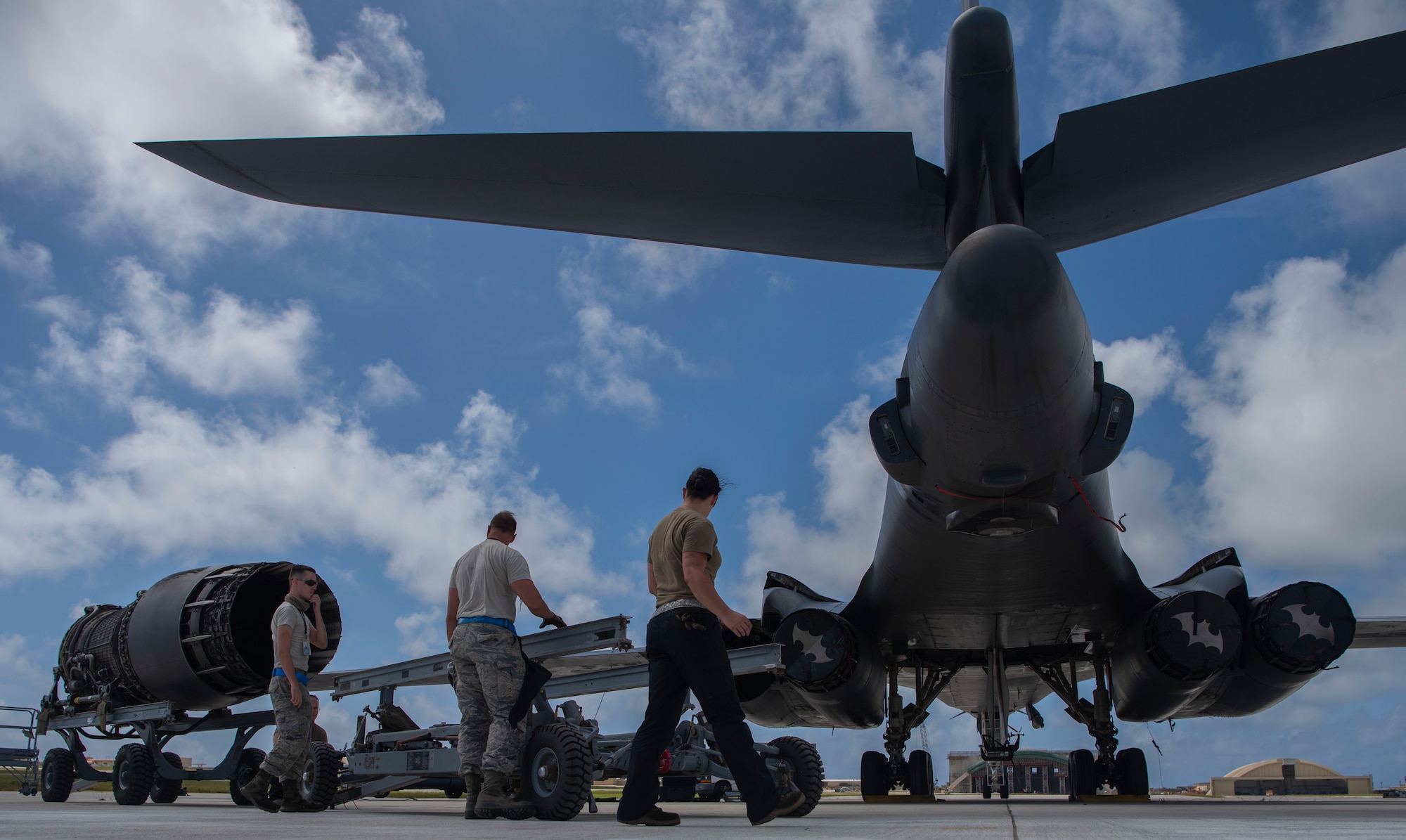 7th Aircraft Maintenance Squadron B-1B Lancer aircraft mechanics prepare to load an engine at Andersen Air Force Base, Guam, May 3, 2020. The B-1 carries four engines that help it reach speeds of more than 900 mph. A Bomber Task Force of four B-1s and approximately 200 Airmen deployed to Andersen as part of the Air Force’s dynamic force employment initiative. (U.S. Air Force photo by Senior Airman River Bruce)