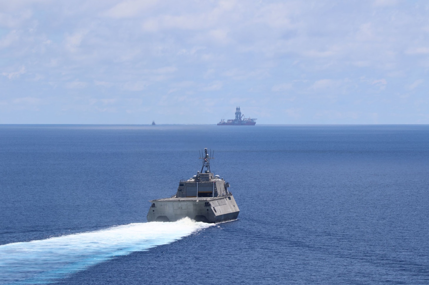 USS Montgomery (LCS 8) and USNS Cesar Chavez (T-AKE 14) operate near drillship West Capella