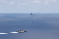 USS Montgomery (LCS 8) and USNS Cesar Chavez (T-AKE 14) operate near drillship West Capella