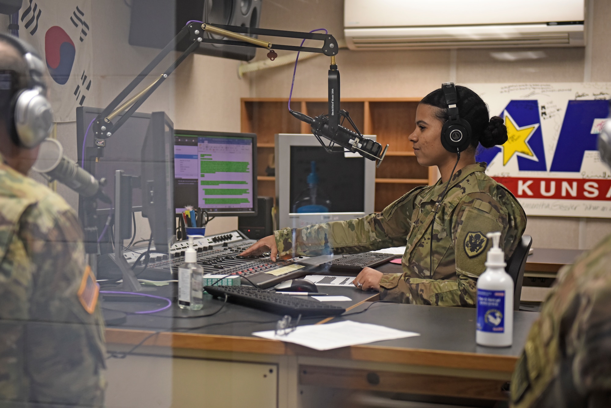 U.S. Air Force Staff Sgt. AJ Duprey, American Forces Network video NCO in charge, conducts a radio show at Kunsan Air Base, Republic of Korea, April 28, 2020. AFN Kunsan is a joint organization, helping commanders maintain readiness and morale through the dissemination of fun, engaging and informative content on the radio, social media and television. (U.S. Air Force photo by Staff Sgt. Mackenzie Mendez)