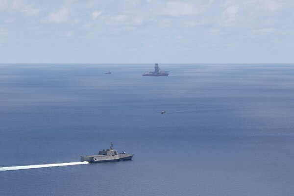 USS Montgomery (LCS 8) and USNS Cesar Chavez (T-AKE 14) operate near drillship West Capella