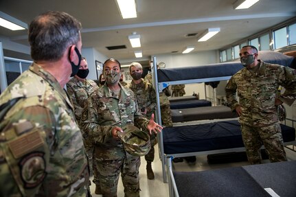 Air Force Chief of Staff Gen. David L. Goldfein (left) and Chief Master Sgt. Manny Pineiro (right), the service's first sergeant special duty manager, visit the Legacy Dormitory May 7, 2020, at Joint Base San Antonio-Lackland, Texas.