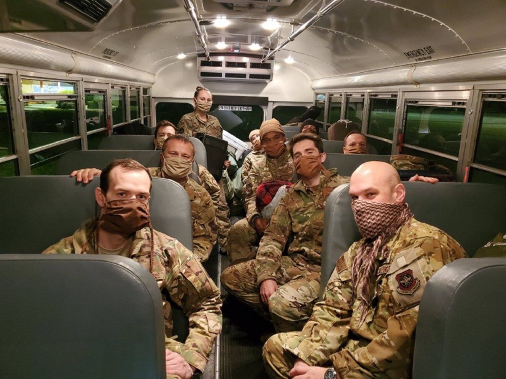 Members of the 22nd Airlift Squadron wear face masks April 11, 2020, during a deployment to Germany. The masks were made by Jenn Taylor, a military spouse who sewed more than 325 masks in April for the Travis Air Force Base, California, community. Taylor’s husband, Tech. Sgt. Adam Taylor, a Travis AFB Airman, is on a yearlong deployment to Incirlik Air Base, Turkey. (Courtesy photo)