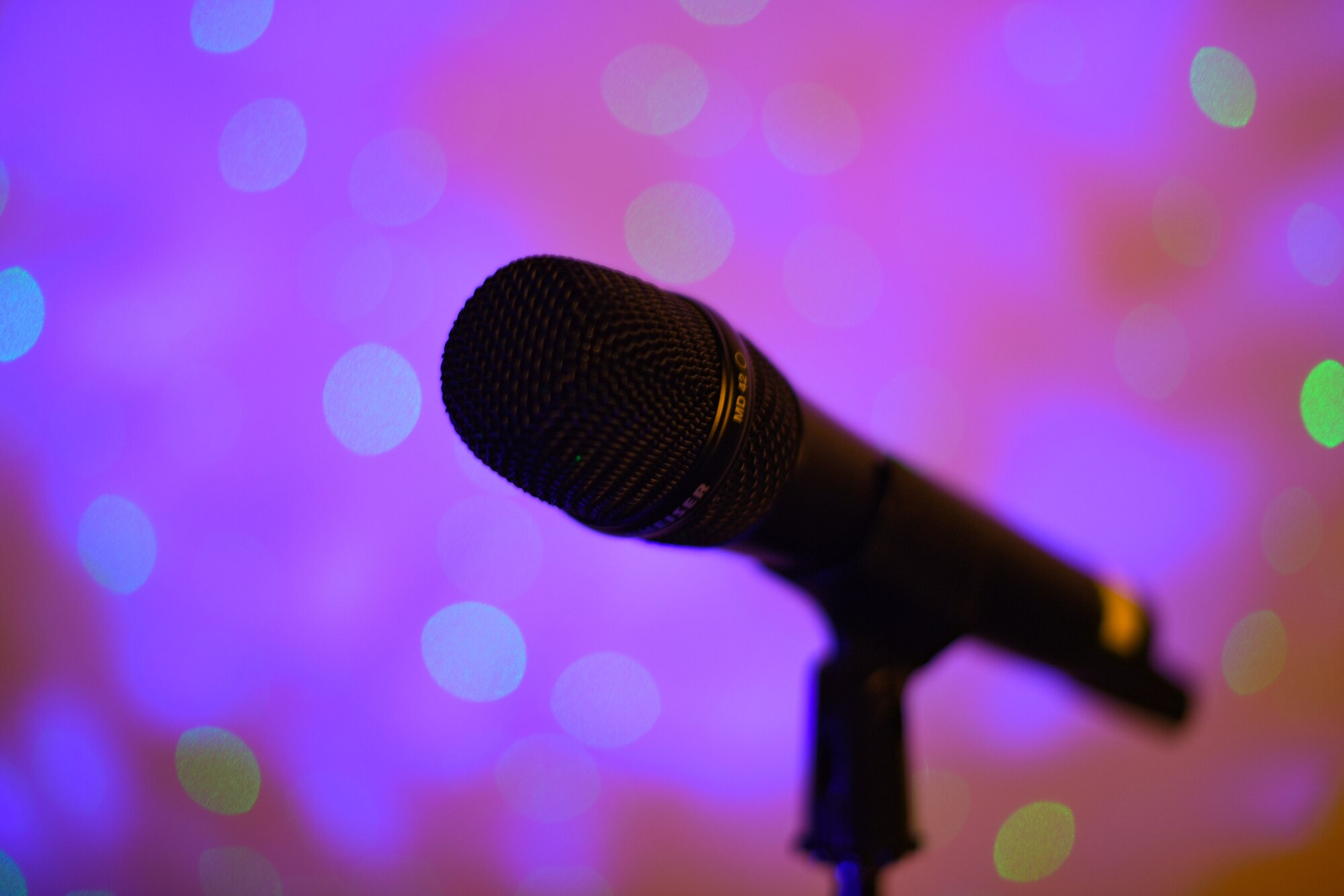 A microphone sits on a stand at Aviano Air Base, Italy, May 7, 2020. Senior Airman Trey McClain, a diagnostic imaging technician with the 31st Medical Support Squadron performs stand-up comedy in his free time. (U.S. Air Force photo by Airman Thomas S. Keisler IV)