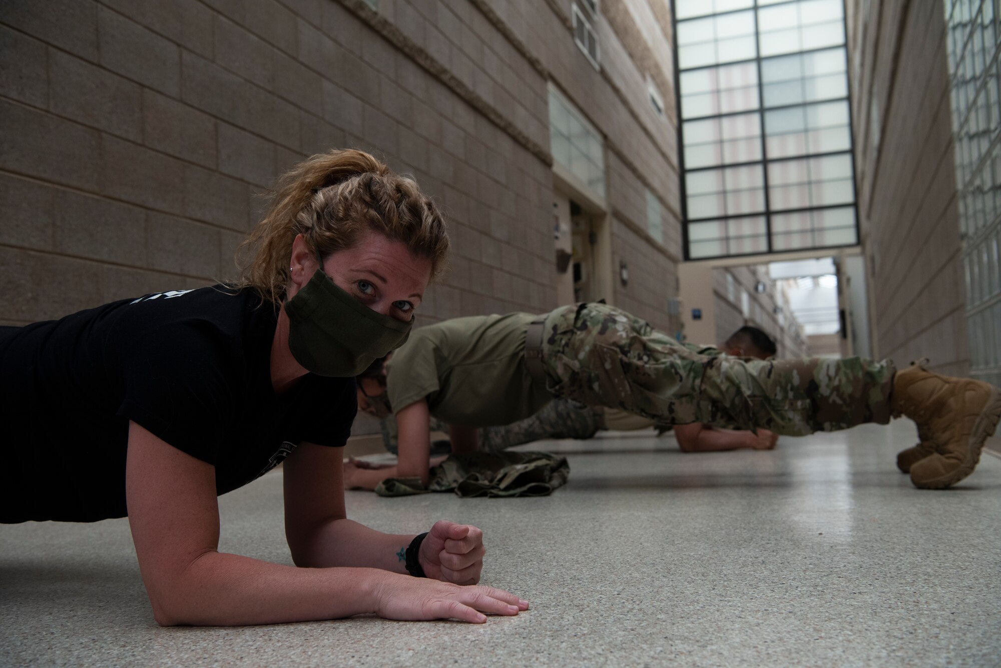 Image of U.S. Air Force Maj. Samantha Warren practicing social distancing while keeping fit.