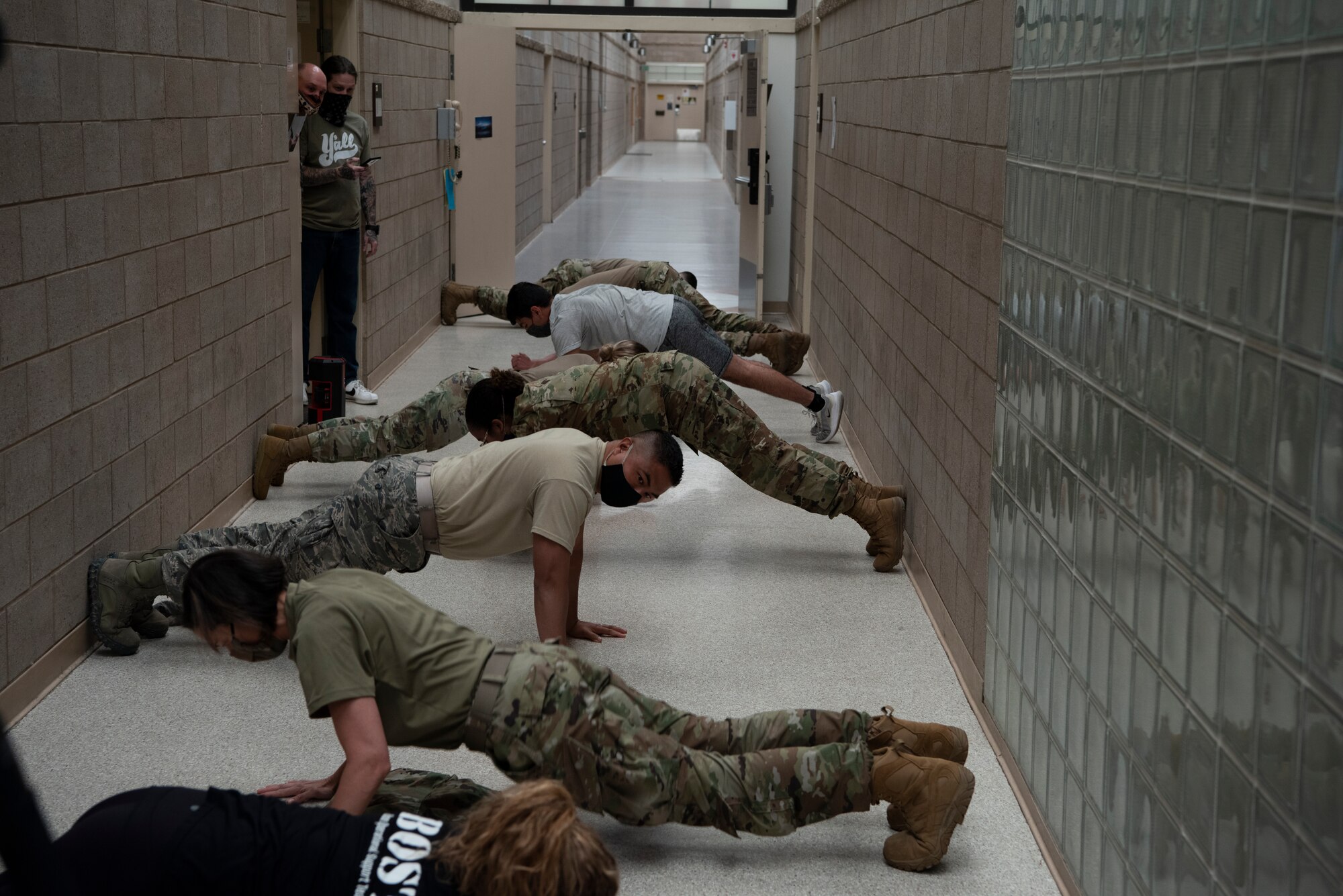 Image of 366th Maintenance Squadron members practicing social distancing while keeping fit.