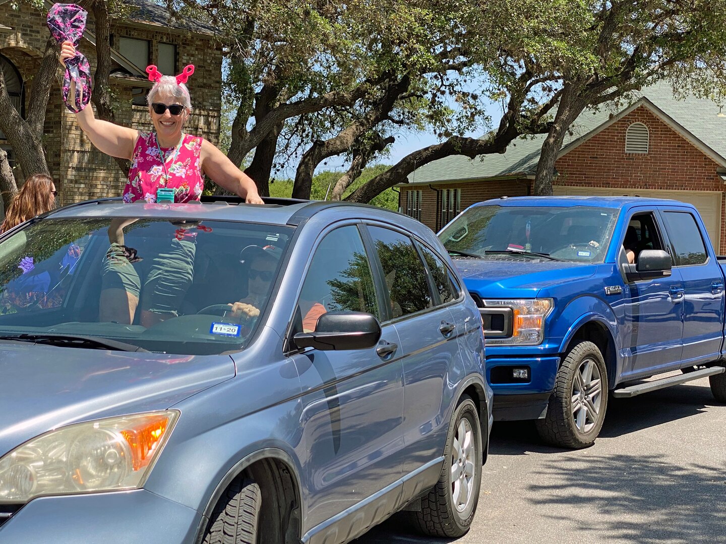 Neighbors thank organizer with surprise parade after COVID-19