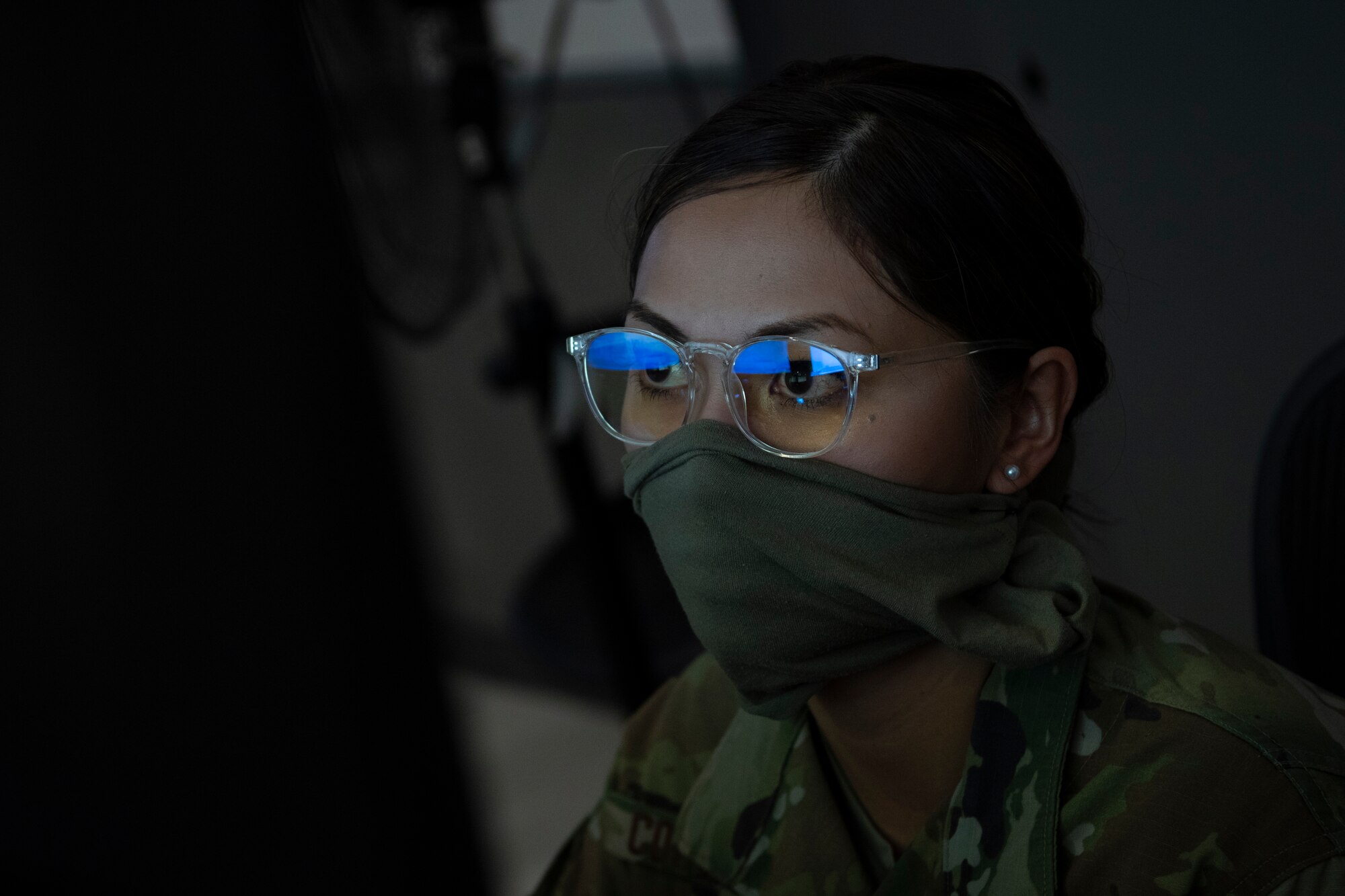 An Airman assigned to the 609th Air Operations Center performs tasks inside the Combined Air Operations Center at Al Udeid Air Base, Qatar, April 20, 2020.