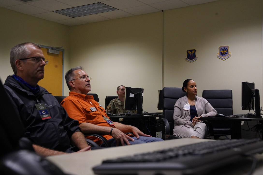 Command and control apprentice course instructors attend a zoom meeting inside Cody Hall at Keesler Air Force Base, Mississippi, May 6. Students from the University of Southern Mississippi presented their project of solving how to make command and control training more engaging and accessible. (U.S Air Force photo by Airman 1st Class Spencer Tobler)