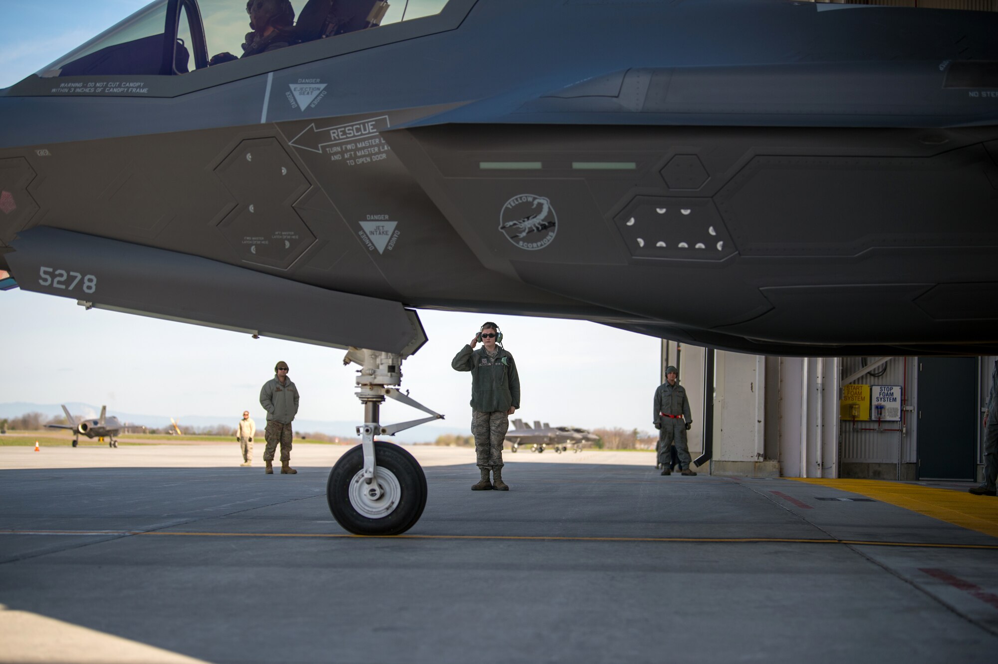 Airman 1st Class Isabel Murphy, a crew chief assigned to the Maintenance Group at the 158th Fighter Wing, launches an F-35 Lightning II at the Vermont Air National Guard Base.