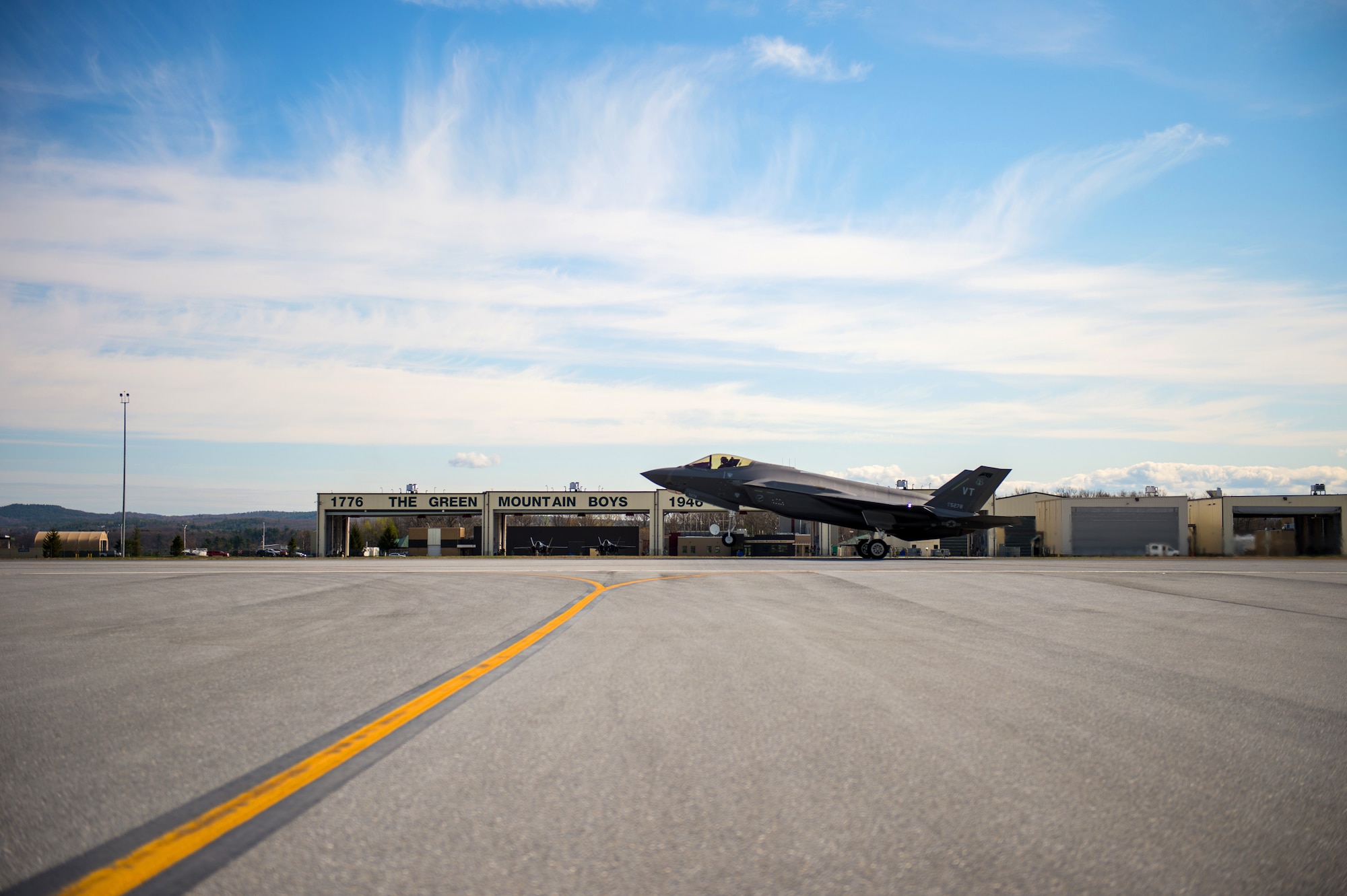 An F-35 Lightning II, Tail 5278, takes flight from the Vermont Air National Guard Base.