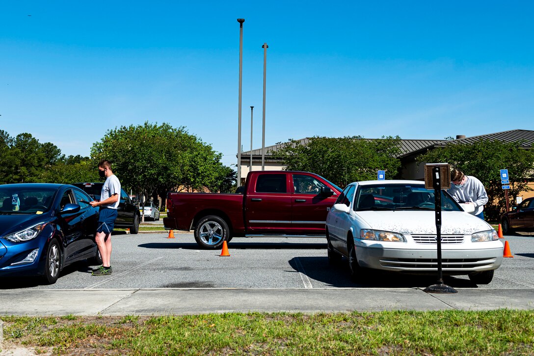 Photo of Airmen processing patients.