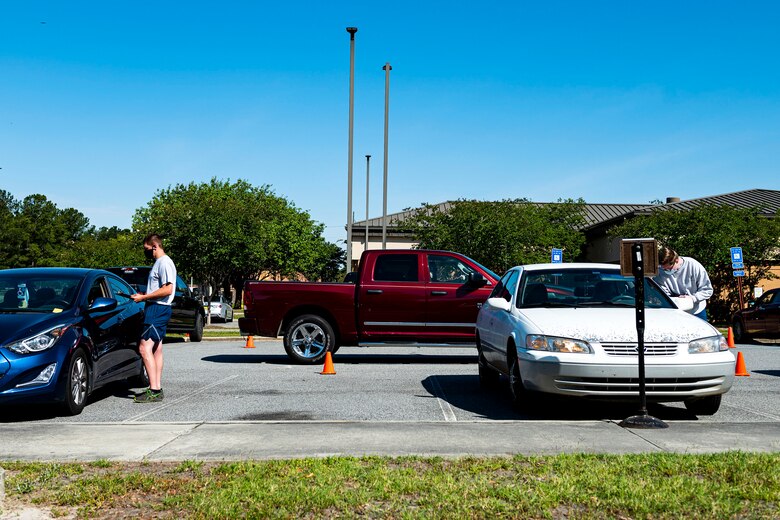 Photo of Airmen processing patients.