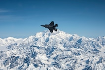 An F-35A Lightning II assigned to the 356th Fighter Squadron at Eielson Air Force Base flies over Denali National Park in Alaska May 5, 2020.