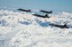 Two F-35A Lightning IIs assigned to the 354th Fighter Wing at Eielson Air Force Base and two F-22 Raptors assigned to 3rd Wing at Joint Base Elmendorf Richardson fly over Alaska May 5, 2020.