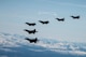 Two F-35A Lightning IIs and two F-16 Fighting Falcons assigned to Eielson Air Force Base fly alongside two F-22 Raptors assigned to Joint Base Elmendorf-Richardson as part of a mass formation flight May 5, 2020.