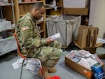 Indiana National Guard medics with 2-151 Infantry headquarters company assist medical professionals at Pendleton Correctional Facility April 30, 2020. The medics conduct sick call operations, perform blood draws, and dispense medicine as prescribed by Indiana Department of Corrections doctors and nurses while maintaining social distancing standards.