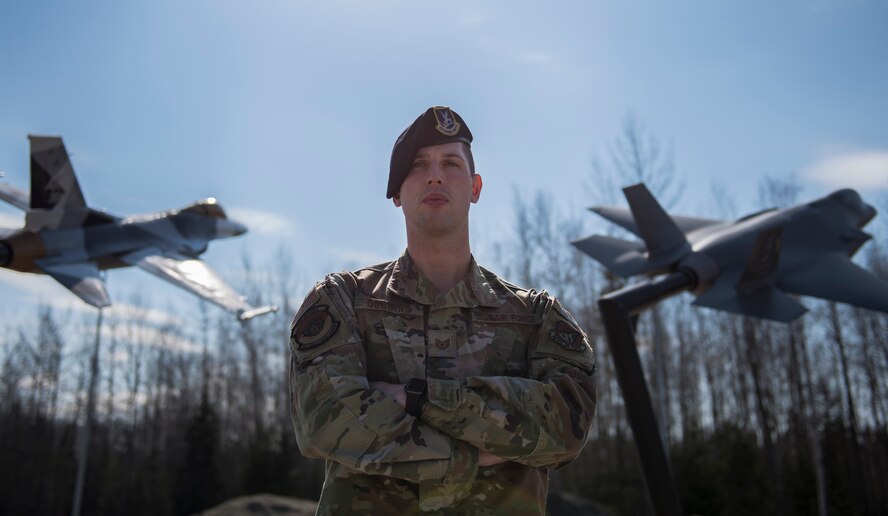U.S. Air Force Tech. Sgt. Matthew R. Dobbins, the 354th Security Forces Squadron (SFS) non-commissioned officer (NCO) in charge of operations, poses for a photo at Eielson Air Force Base, Alaska, April 28, 2020.