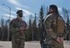 U.S. Air Force Tech. Sgt. Matthew R. Dobbins, the 354th Security Forces Squadron (SFS) non-commissioned officer (NCO) in charge of operations, performs a post briefing with Senior Airman Justin Wilson, a 354th SFS response force officer, at Eielson Air Force Base, Alaska, April 28, 2020.