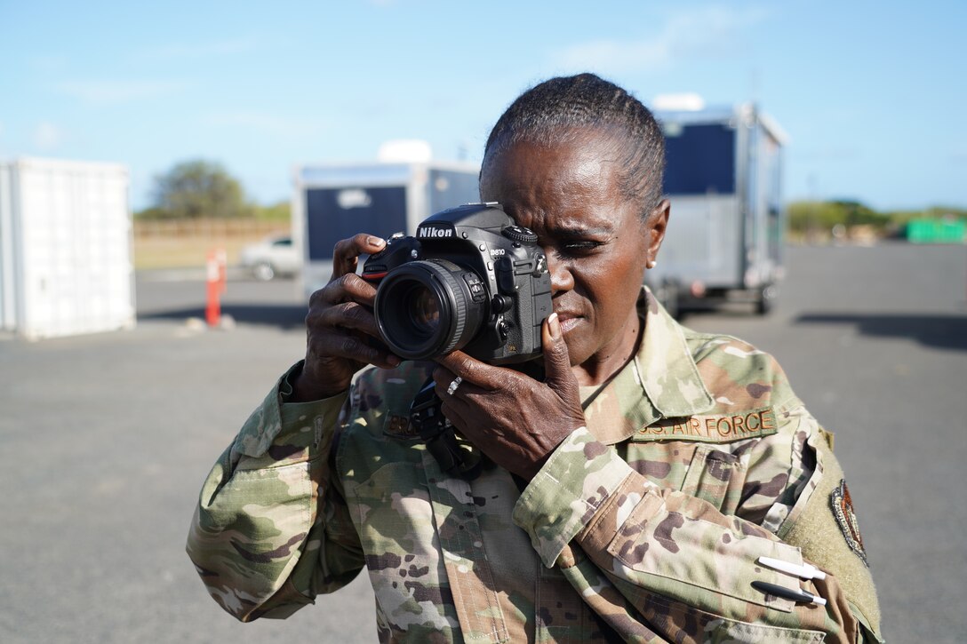 U. S. Air Force Tech. Sgt. Alison Bruce-Maldonado, 154th Wing public affairs non-commissioned officer in charge, captures images at Naval Air Station Barber’s Point, Hawaii, Feb. 28th, 2020. Bruce-Maldonado will retire this August with 30 years of service in the Air Force and Marine Corps combined.