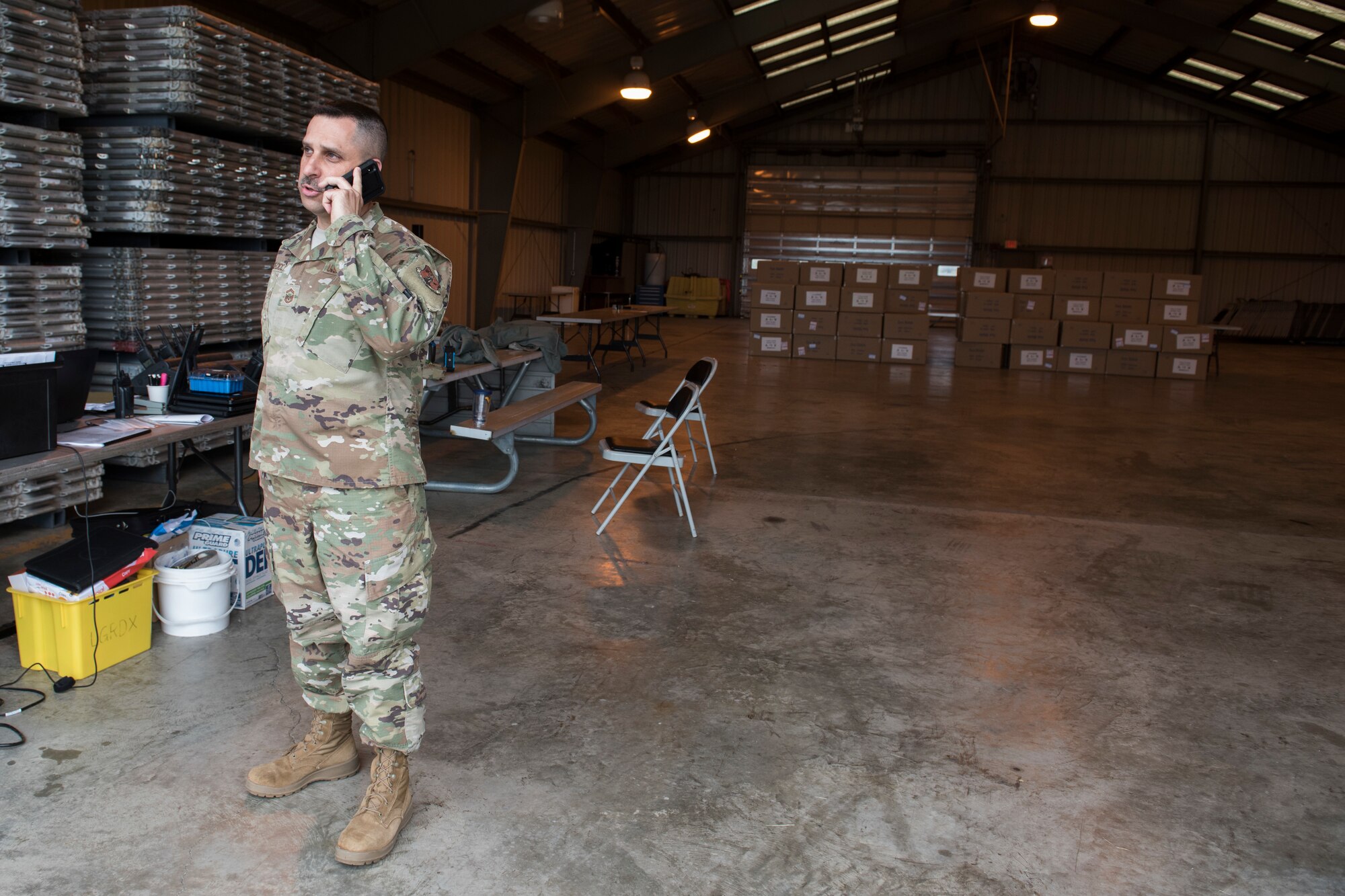 Senior Master Sgt. Jim DeCicco, the non-commissioned officer in charge of the West Virginia National Guard’s Task Force Sustainment East, coordinates a shipment of personal protective equipment from the 167th Airlift Wing, April 24, 2020. The task force is responsible for the transport of PPE to emergency management offices throughout the eastern panhandle West Virginia.